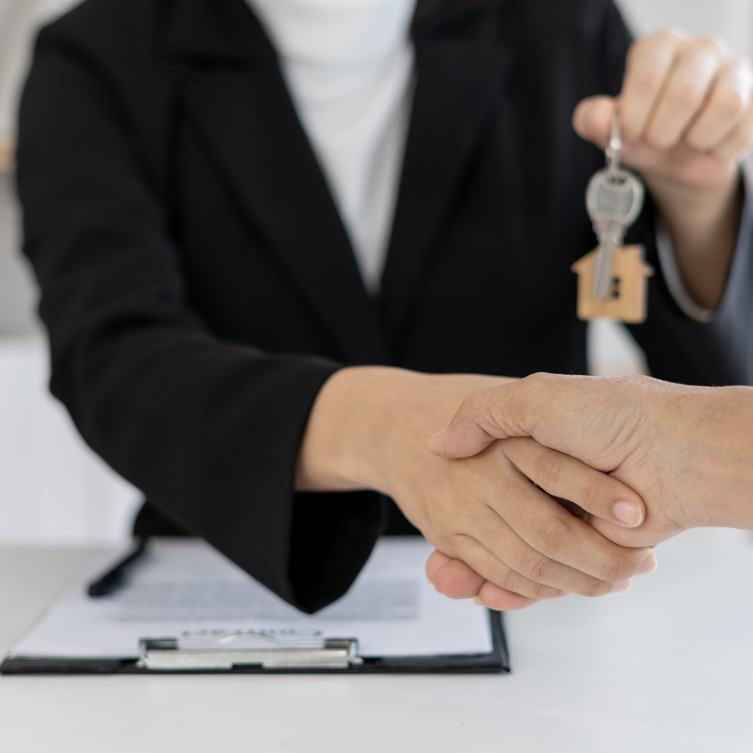 A landlord and new resident shaking hands after using professional tenant placement services Dallas to secure a high-quality lease.