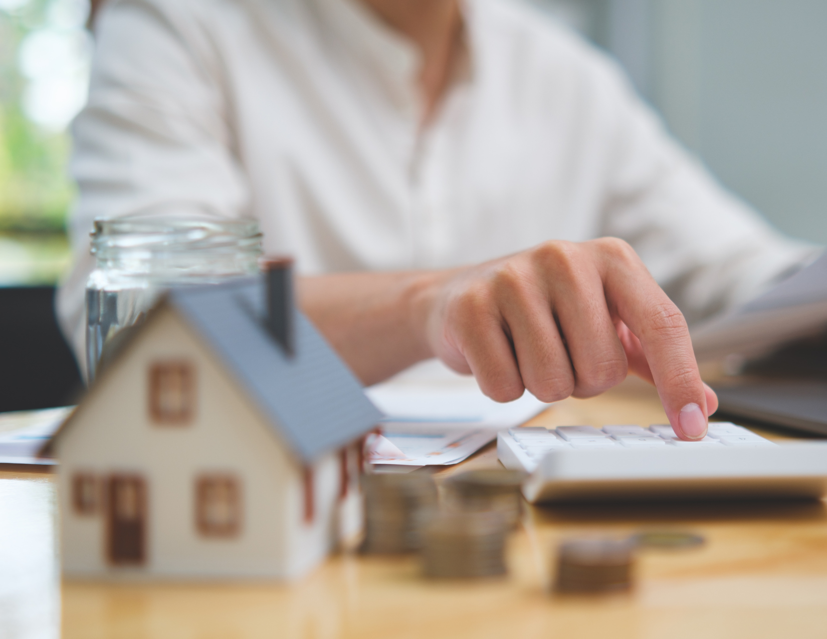 A real estate investor reviewing multi-property financial reports enabled by property accounting services in Texas.