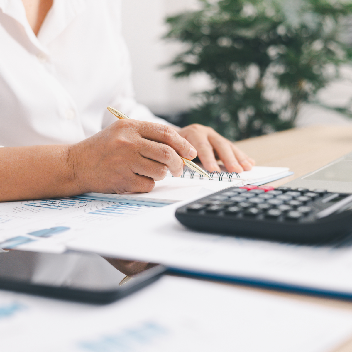 Financial report and calculator representing property accounting services in Texas